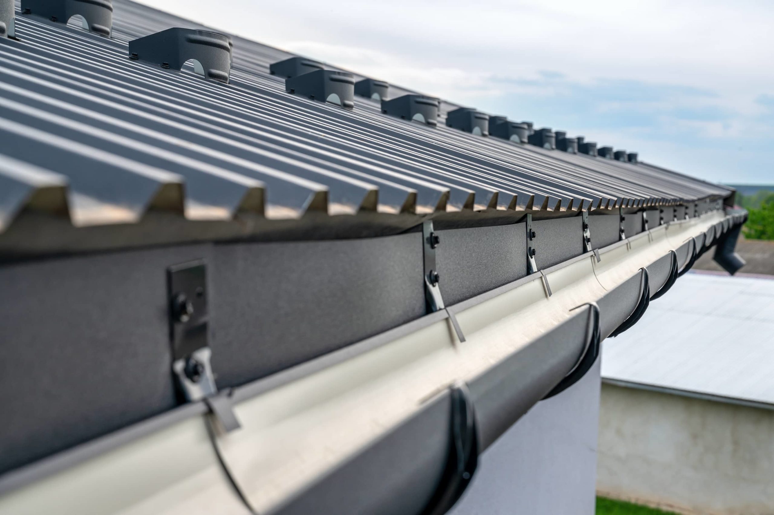 This is an image of a newly installed rain gutter on a residential property.